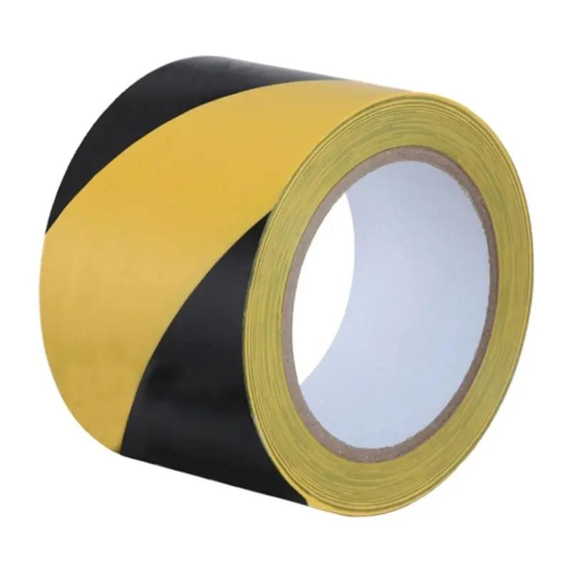 FITA DEMARCACAO DE AREA PRETA/AMARELA ADERE 870 70MMX200M